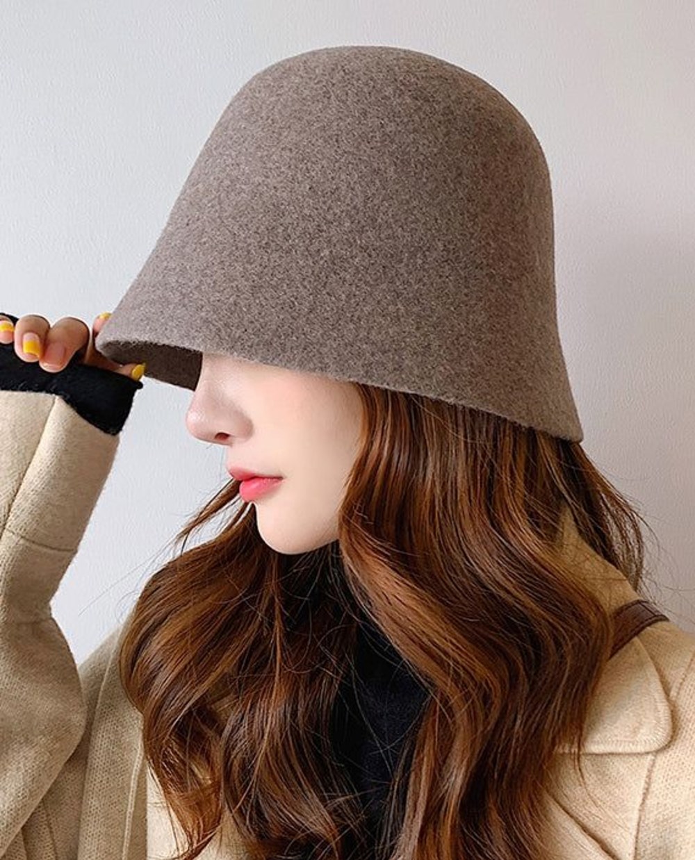 قبعات البوكت الصوفية.. إكسسوار تحتاجين إليه هذا الشتاء